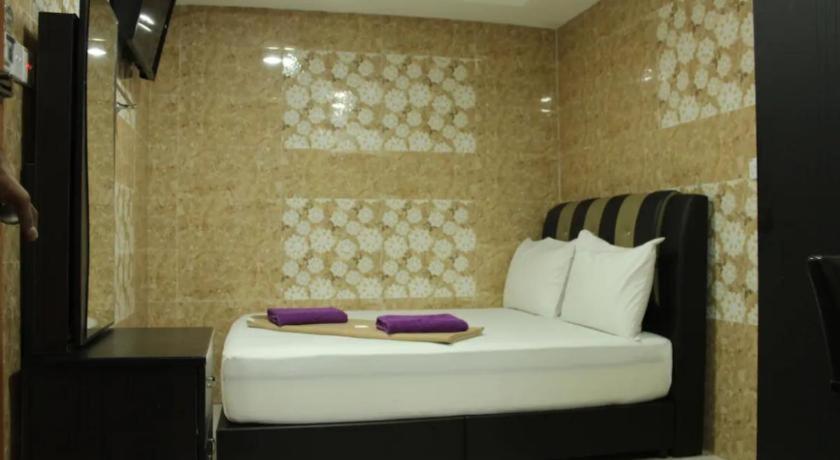 Ark Hotel Batu-grotten Buitenkant foto
